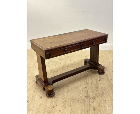 A 19thc mahogany sofa table in a Beidermeier style, the rectangular top above two frieze drawers, on end columns and bipod su