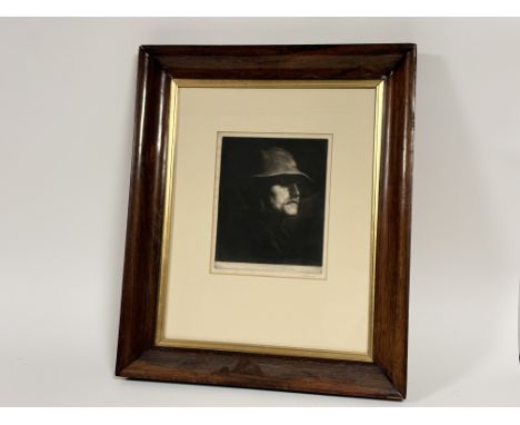 William Strang RA (Scottish 1859-1921) Head of a Peasant, mezzotint etching, signed pencil bottom right, in a glazed wooden f