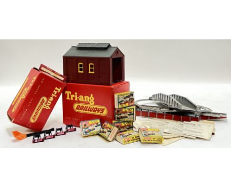 Vintage toys, a Tri-ang Railways OO Gauge R.76 Engine Shed with original box, together with various Tri-Ang track, a quantity