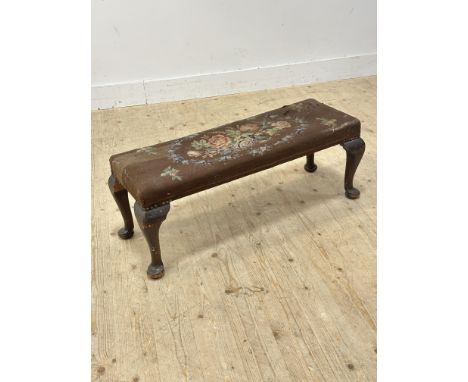 An Edwardian stained beech fender stool, with tapestry panel top (h.35cm x l. 92cm x w. 34cm)