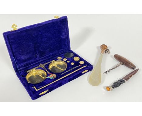 A set of cast brass scales with fitted velvet box and related weights/measures etc...(box w- 23.5cm), together with a J Nowil