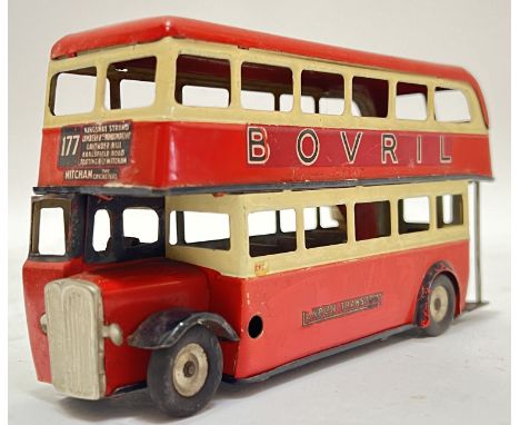 Vintage toys, a TRI-ANG Minic double decker bus mechanical toy with Ovaltine/Bovril advertising (lacking key, l- 19cm)