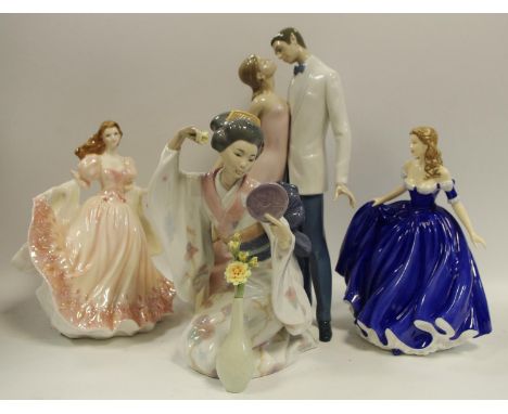A Lladro figural group, Happy Anniversary, no.6475, approx 31cm high; a Lladro figure of oriental girl holding a mirror with 