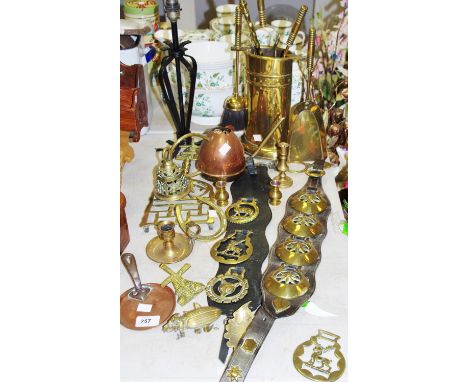 Metalware - an early 20th Century brass fireside companion set; a late 19th Century set of horse brasses; a brass trivet; a w