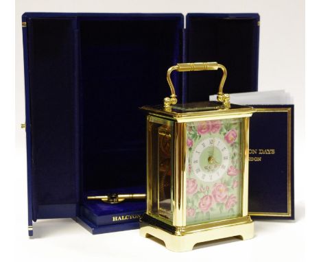 A with Halcyon Days Enamel brass cased carriage clock, pink rose dial plate and single train movement, limited edition 92/250