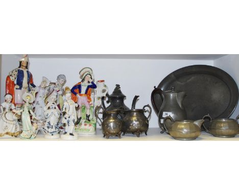 A palnished pewter coffee pot; creamer, sucrier and oval tray; a three piece plated tea set; Decorative ceramics - a Stafford