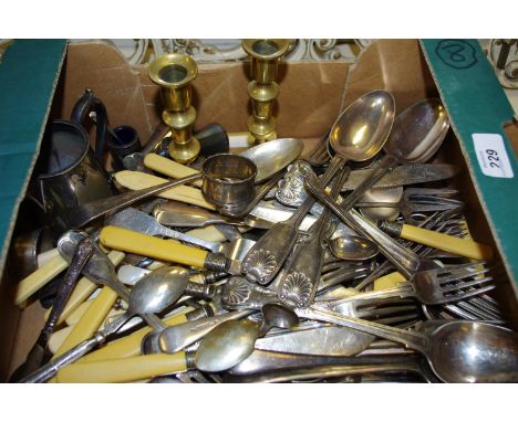 Two silver napkin rings, plated flatware, sparrow beak jug, cruet, two brass candlesticks.
