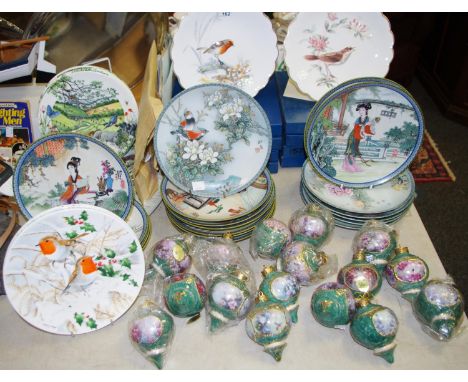 Sixteen Bradford Exchange ceramic garden baubles; eight Wedgwood Colin Newmans river panorama plates; other collectors plates