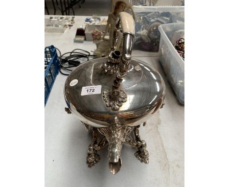 AN ORNATE SILVER PLATED SPIRIT KETTLE WITH BONE HANDLE ON A MATCHING STAND 