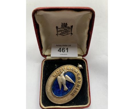 A BOXED LARGE OVAL SILVER GILT WEST LANCASHIRE PENDANT DEPICTING A DOVE ON A BLUE BACKGROUND 