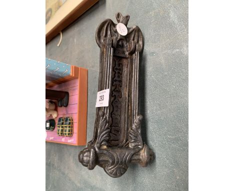 A VICTORIAN ORNATE CAST LETTERBOX AND KNOCKER WITH BAT DETAIL 