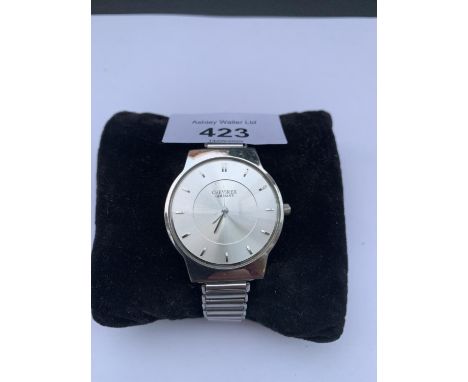 A CHEVIREX GERMANY SILVER METAL WRIST WATCH IN WORKING ORDER 