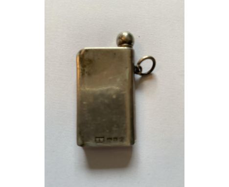 A 1912 HALLMARKED LONDON SILVER LIGHTER IN THE FORM OF A BOOK 