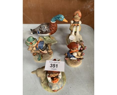 FIVE GOEBEL FIGURES TO INCLUDE A GIRL AND A LAMB, A GIRL IN A TREE, A BOY ON A FENCE, A GIRL WITH GEESE AND A MALLARD DUCK 