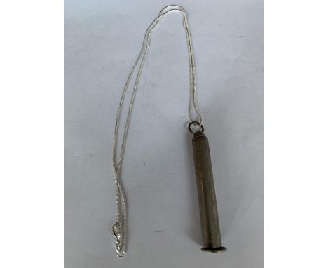 A SILVER NECKLACE WITH A PIPE SMOKERS TOOL TO INCLUDE A TAMPER AND THREE CLEANING TOOLS 