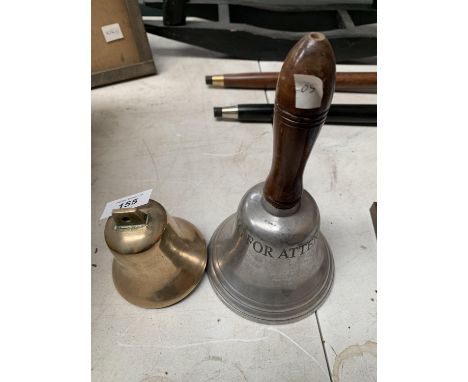 TWO VINTAGE METAL BELLS ONE WITH A WOODEN HANDLE AND 'RING FOR ATTENTION' ON SILVER METAL AND OTHER A BRASS WITH HANGING HOLE