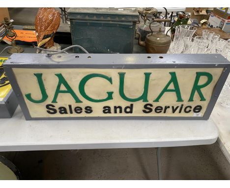 A JAGUAR SALES AND SERVICE ILLUMINATED LIGHT BOX SIGN 91CM X 31CM X 10CM 