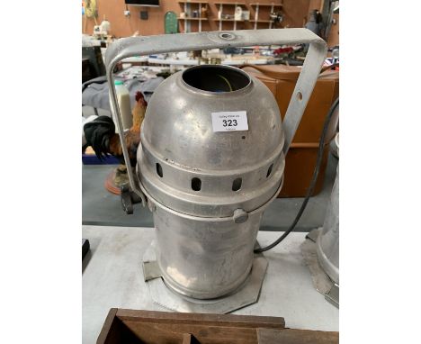 A VINTAGE METAL STAGE LIGHT 