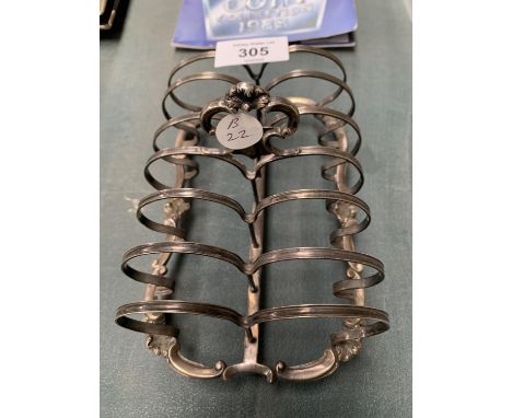 A GEORGIAN ORNATE SILVER SIX SLICE TOAST RACK 