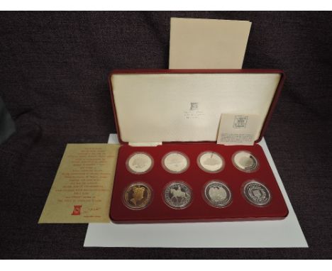 A Pobjoy Mint 1977 The Queens Silver Jubilee 8 Coin Set in solid Sterling Silver including Gibraltar, Mauritius, St Helena Tr