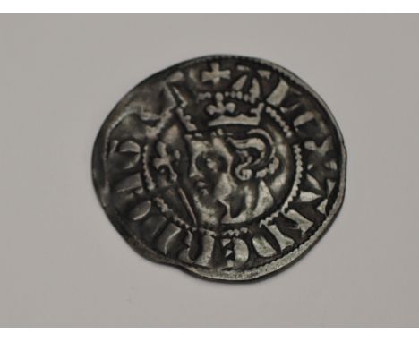 An Alexander III 1280-1286 Silver Penny, portrait side has head with crown holding staff, long cross back with lettering REX 