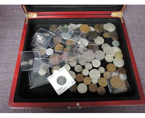 A wooden case containing World Coins including Silver and Hammered, 1860 Farthing, 1771 Half Penny, 1915 Half Crown, Australi