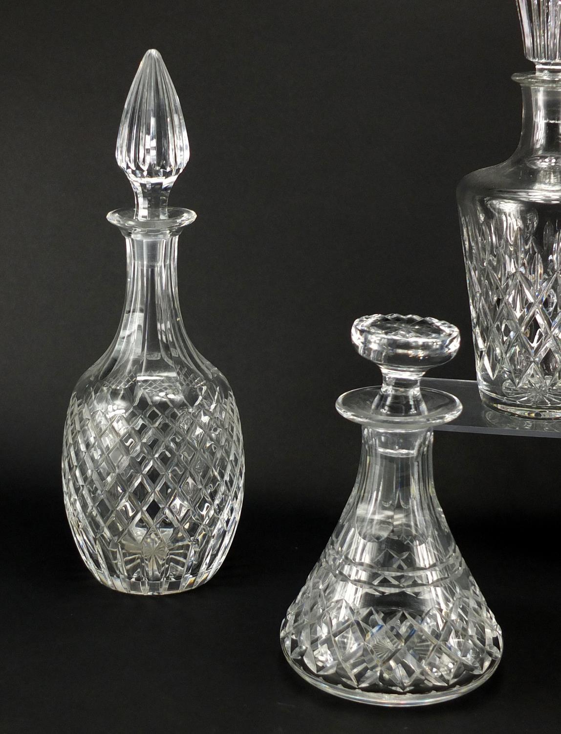 Five cut glass decanters including Tudor Royal Doulton and Royal ...