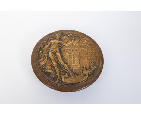 George Tucker - A 1921 Brooklands BMCRC Bronze Roundelmounted on wooden plaque, 22cm diameter with British Motor Cycle Racing