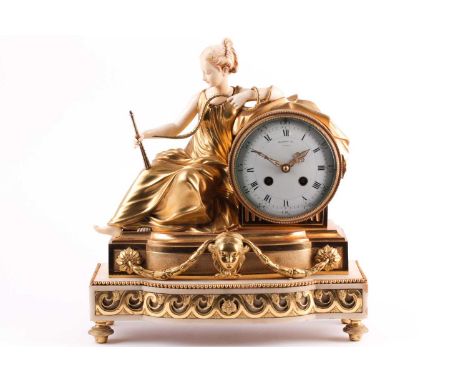 A fine and unusual 19th-century white marble, ivory and ormolu mantel clock, by Maple Co, Paris, the drum dial beside a seate