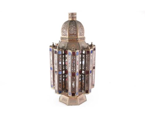 A large Middle Eastern brass and coloured-glass Mosque lamp, of octagonal form with eight outer lobes, pierced decoration wit