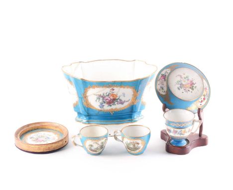 A collection of 18th century and later Sevres Bleu Celeste, comprising a cabinet cup and saucer, two further cups, a framed p