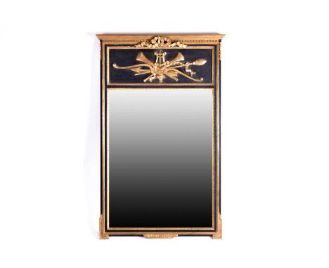 A French Empire design ebonized trumeau type wall mirror, 20th century. With ribbon cresting above a frieze decorated with ca