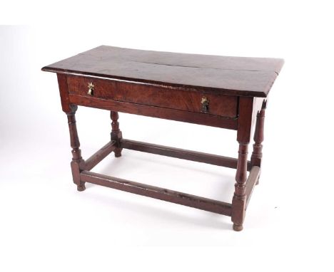 An unusual late 17th-century burr elm and oak single drawer rectangular side table, the top and elements of the carcass worke