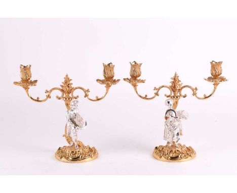 A pair of 1960s heavy cast silver and silver gilt figural candelabra. London 1967 by C.J. Vander &amp; Co. Each silver-gilt r
