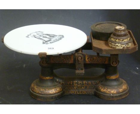 Set of Victorian shop balance scales by R Webb & Co, 100 High St, Marlylebone, with pottery circular plate and stacking weigh