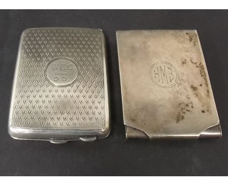Two silver match book holders, one engine turned, both Birmingham 1923.