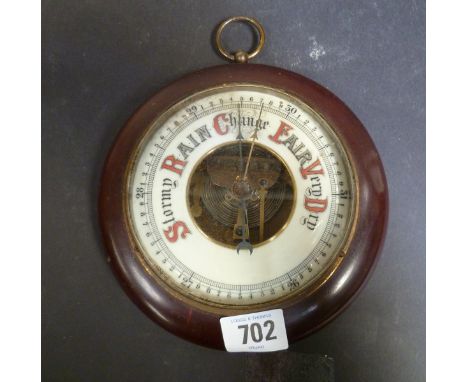 Aneroid barometer thermometer in turned wood case, diameter 6.25".