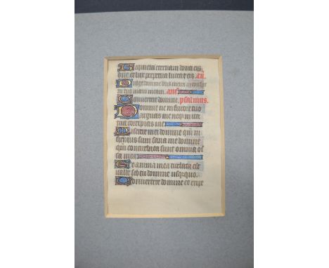 A pair of illuminated double sided manuscript pages, the parchment with blue, red and gold embellishments, each 7" x 5".