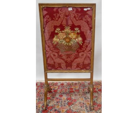 Victorian gilt wood and gesso framed fire screen of rectangular form, glazed and inset with metal thread embroidery and silk 
