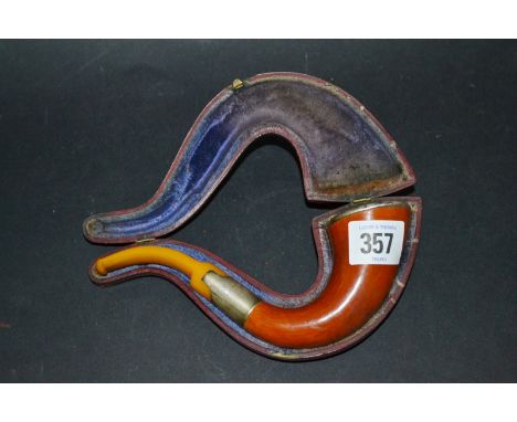 Large silver mounted Meerschaum pipe with butterscotch amber mouthpiece, red morrocan leather case.