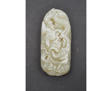 Good Chinese white jade oval carving of an exotic bird on a foliate branch, length 3.5".