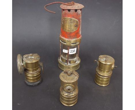 Thomas & Williams Ltd Cambrian miners lamp, together with three brass "Premier" carbide lamps.