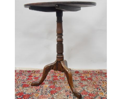 George III mahogany tripod table with baluster ring turned pedestal and three outswept feet, diameter 22.5".