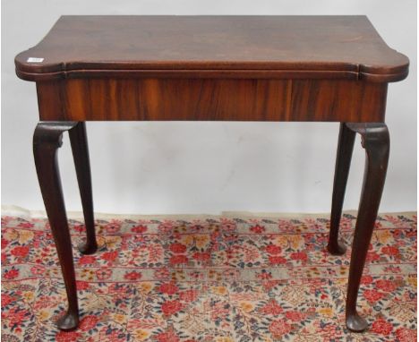 George II mahogany fold over card/tea table, the hinged rectangular top with outset corners over a plain, rosewood veneered f