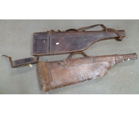 Two leather "leg-o-mutton" gun cases.