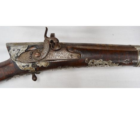 Interesting Ottoman percussion cap, silver mounted and gold inlaid gun, the 39" octagonal barrel with foliate gold inlay, sil