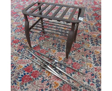 George III steel footman and four steel light rods