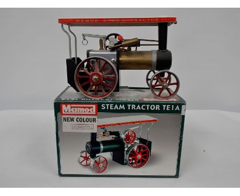 Live steam tractor model TE1A in brown/gold, boxed.