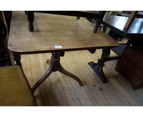 A Georgian oak tilt top tripod table.