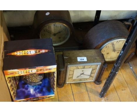 Three assorted oak cased mantel clocks, together with Doctor Who diecast collectable gold dalek.